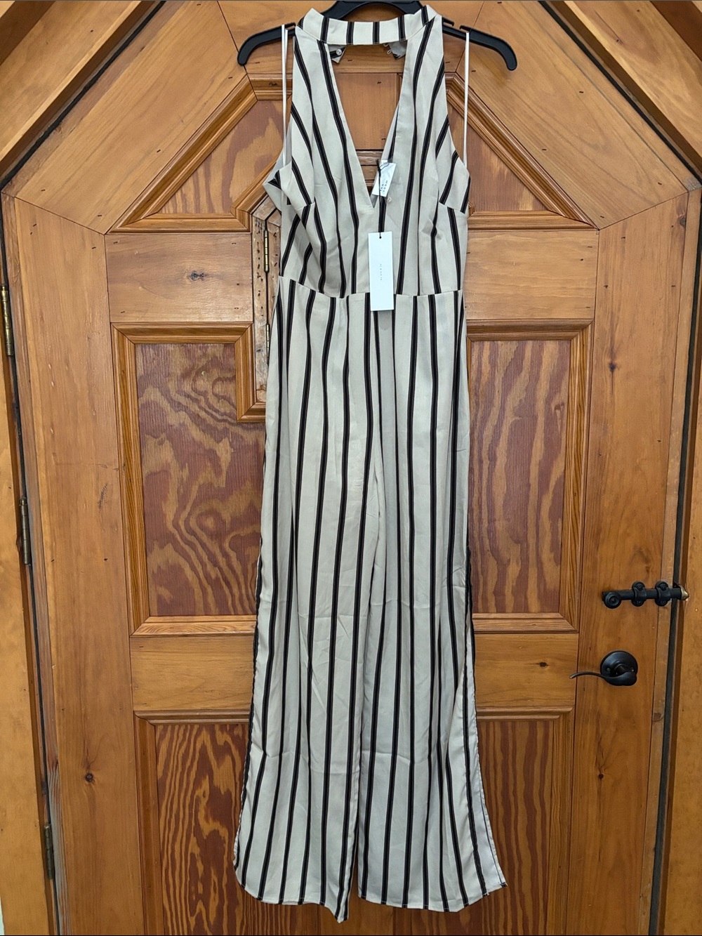 the room Beige Jumpsuit with Black Vertical Stripes